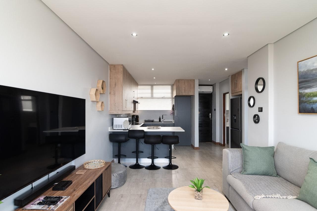 Balcony seating area perfect for morning coffee with ocean sunrise views